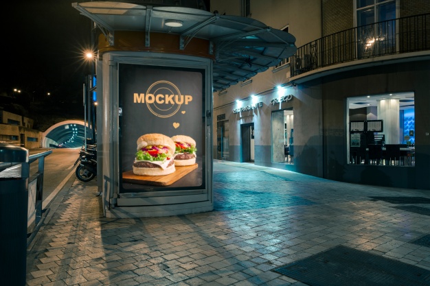 Billboard mockup in urban environment Free Psd