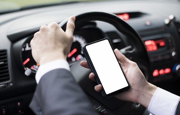 Free PSD iphone in car Mockup