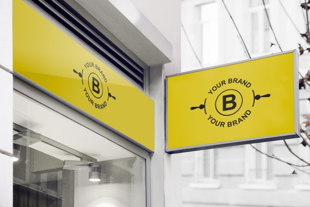 Logo mockup on facade or storefront Free Psd