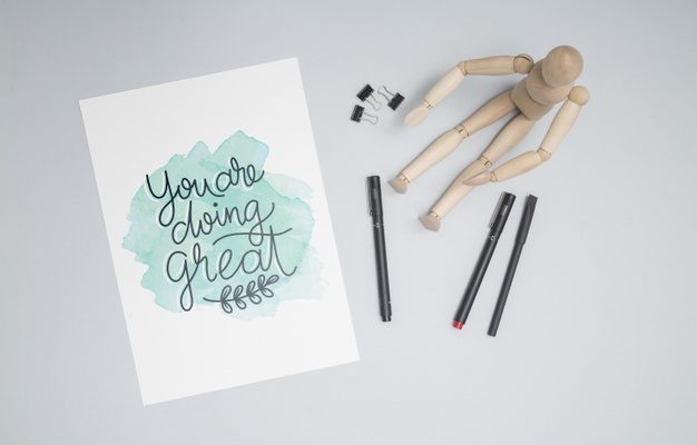 Free PSD wooden doll and pencils Mockup