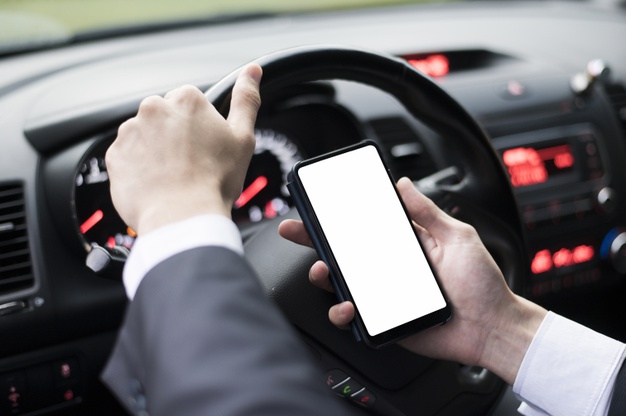 Medium shot of phone in car mock-up Free Photo