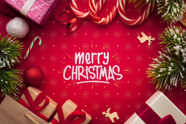Gift boxes and candy canes on christmas red background Free Psd